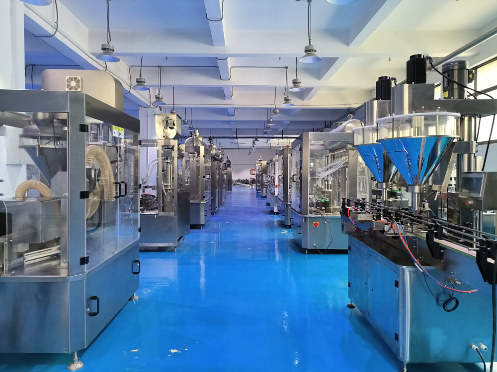 全自動(dòng)粉劑灌裝機(jī)、液體灌裝機(jī)車間